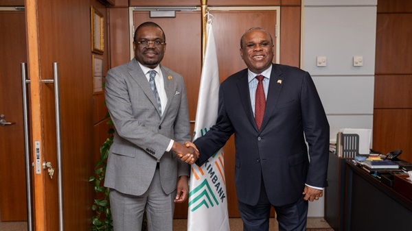 H.E. Dr. Jean Kaseya, Director General, Africa CDC (left) shakes hands with Prof. Benedict Oramah, President and Chairman of the Board of Directors of Afreximbank 